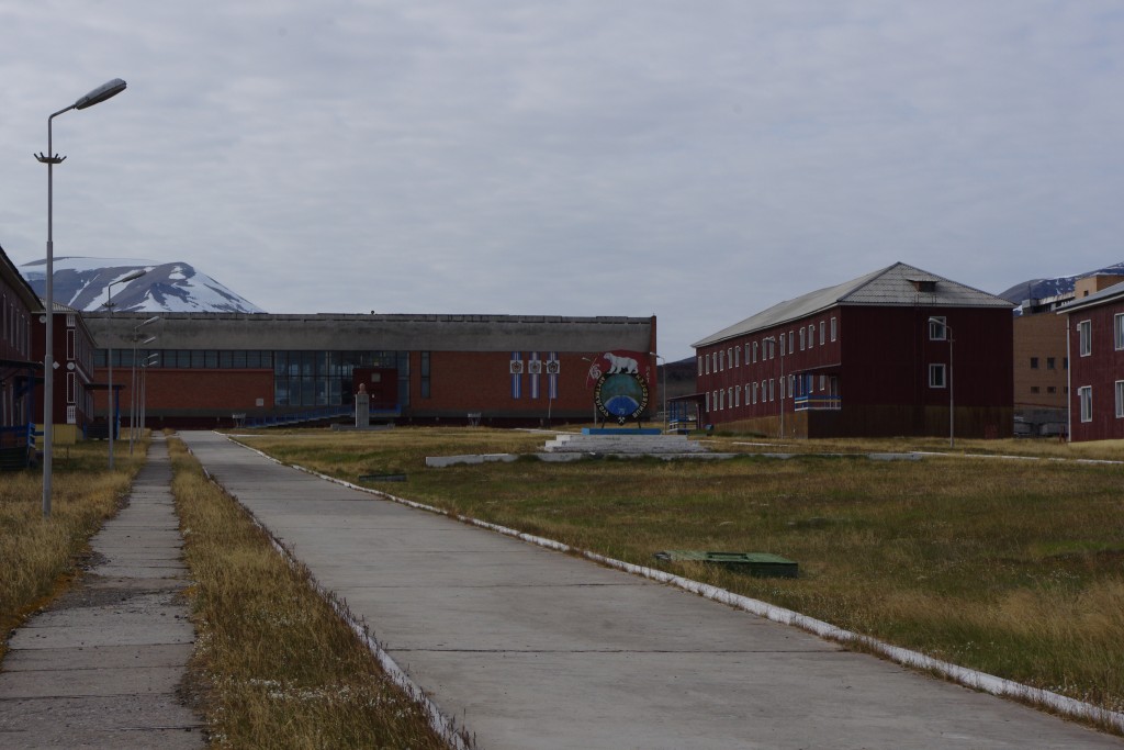 The main street on Pyramiden, called '60th Anniversary of the October Revolution Street', looking towards the Cultural Centre and statue of Lenin.