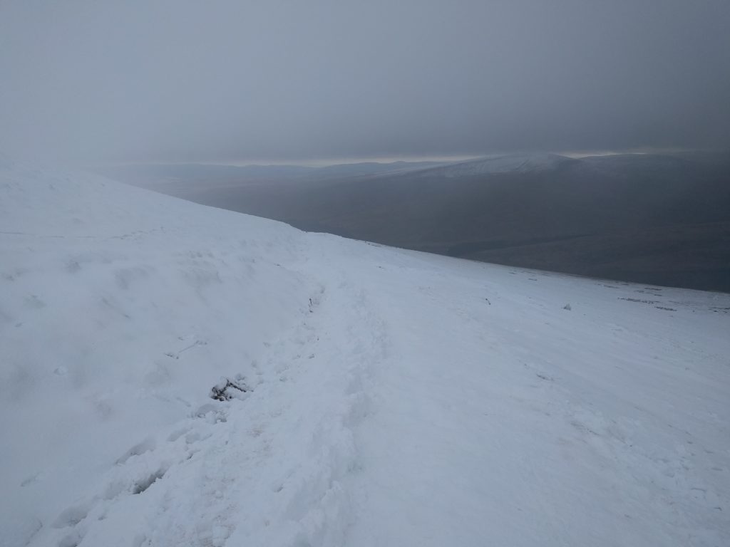 Path just visible under compacted snow