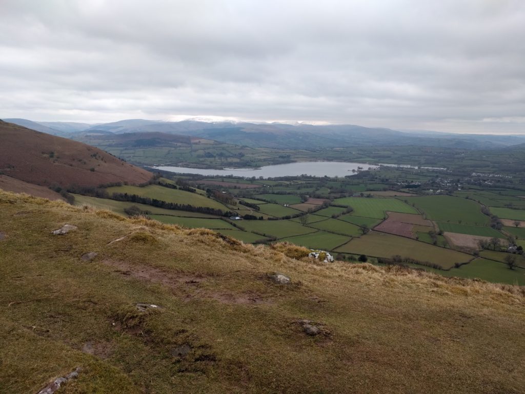 Valley with lake and other mountains on horizon