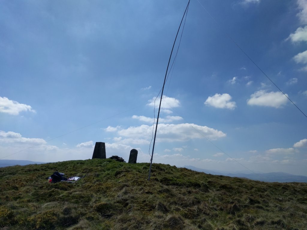 Antenna next to trig point on summit